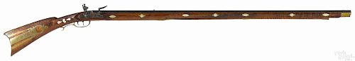 Modern assembled full stock flintlock rifle, .38 caliber, with a 48 3/4'' octagonal barrel.
