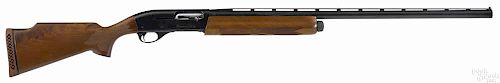 Remington model 11-87 Premier Trap shotgun, 12 gauge, with a ventilated rib, a checkered stock