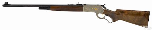 Browning Model 71 high grade rifle, .348 Winchester caliber, with a scroll engraved receiver