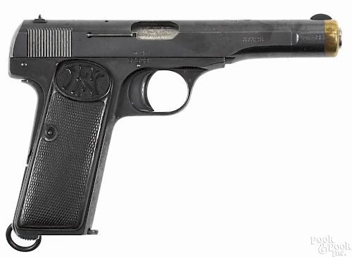 Fabrique Nationale model 1910 semi-automatic pistol, .9 mm, with an incised brass plaque