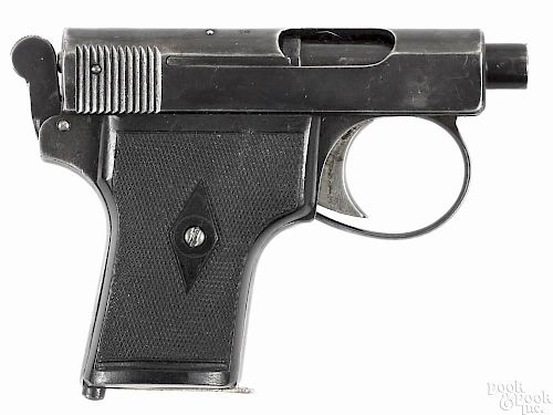 Webley and Scott model 1907 semi-automatic pistol, .25 caliber, with a 2'' barrel. Serial #94428.