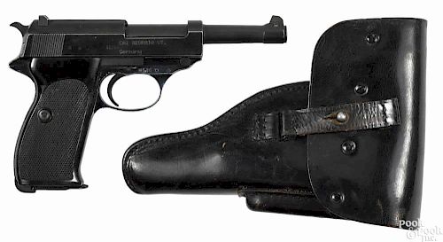 Walther P1 semi-automatic pistol, 9 mm, with a black leather holster, an extra magazine