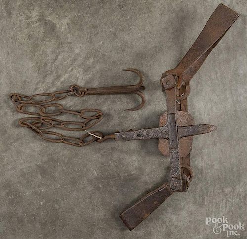 Pennsylvania style wrought iron beaver trap, 19th c., with a double spring, a chain, and a drag