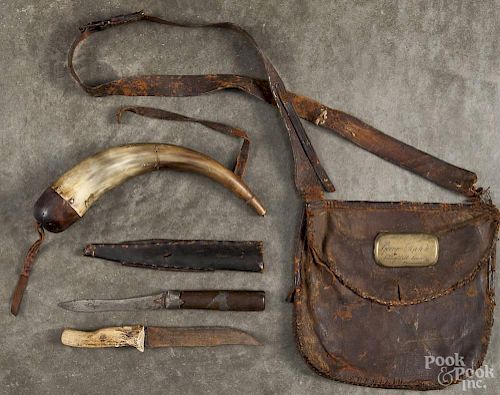 Early Pennsylvania hunting accessories, to include a leather hunting pouch with a brass tag