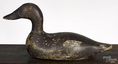 Carved and painted black duck decoy, mid 20th c., 16 1/2'' l.