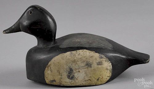 Long Island, New York carved and painted bluebill duck decoy, mid 20th c., 14'' l.