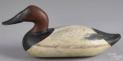 Pair of carved and painted canvasback duck decoys, mid 20th c., 15 1/2'' l.