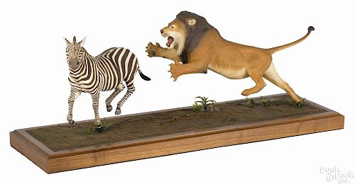 Louis Paul Jonas Studios composition sculpture of a lion attacking a zebra, signed L. E. 40/150