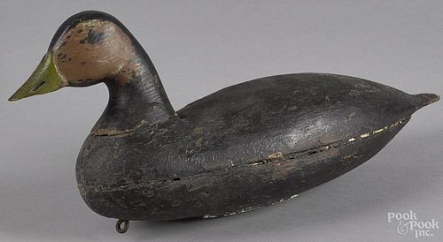 New Jersey carved and painted black duck decoy, early 20th c., 15 1/2'' l.