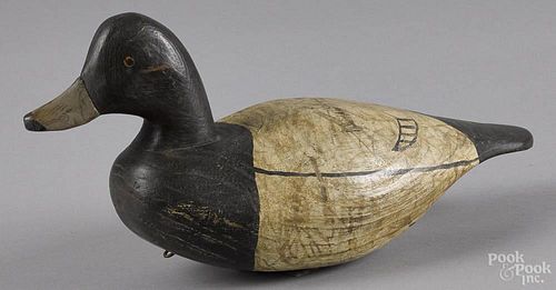 Carved and painted bluebill duck decoy, late 20th c., signed Crossman, 14'' l.