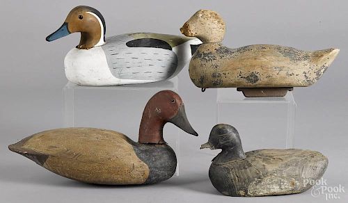 Four carved and painted duck decoys, mid 20th c. and contemporary, longest - 16''.