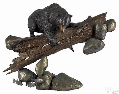 Mark Hopkins (American 20th/21st c.), cast bronze of a bear on a log, titled Catch of the Day