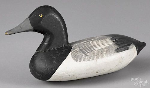 Carved and painted bluebill duck decoy, mid 20th c., attributed to Jess Urie, 14'' l.