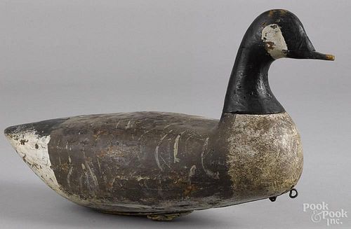 Carved and painted Canada goose decoy, mid 20th c., 24 1/2'' l.