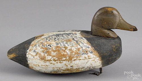 Carved and painted bluebill duck decoy, mid 20th c., 14'' l.
