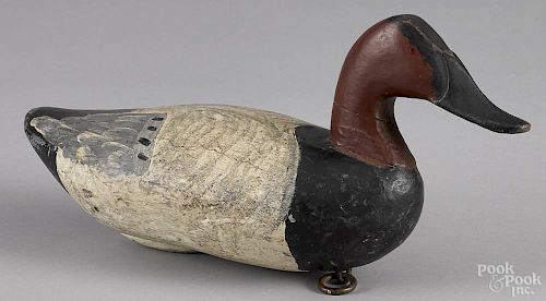 Carved and painted canvasback duck decoy, early/mid 20th c., attributed to John Daddy Holly, 16'' l.