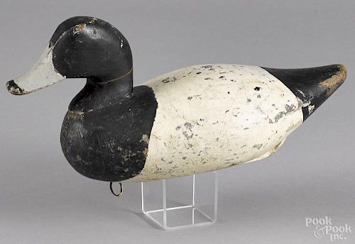Upper Chesapeake Bay carved and painted bluebill duck decoy, mid 20th c., 14'' l.