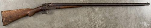 W. Richards double barrel shotgun, 12 gauge, with a 32'' round barrel.