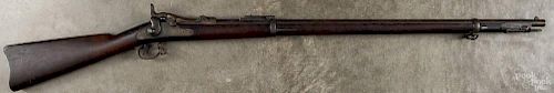 U.S. Model 1888 Springfield trapdoor rifle, .45-70 caliber, with a 32 1/2'' barrel. Serial #521549.