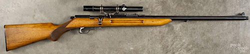 Walther clip fed bolt action rifle, .22 caliber, with a walnut stock, a German scope