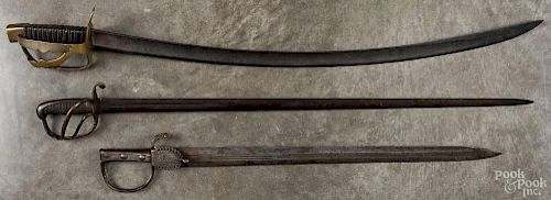Three swords, to include one with a straight, double-sided blade with a brass guard and wire wrap