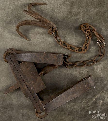Wrought iron bear trap, 19th c., with knuckle springs, a chain, and a drag, overall - 27 1/4'' l.,