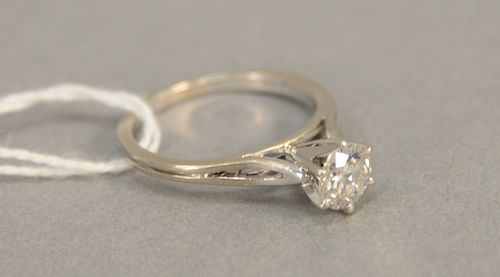 14K white gold ring set with center diamond, approx .80 cts.