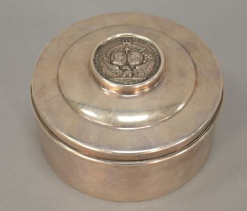 Round sterling silver covered box mounted with Napoleon medallion, ht. 3 in., dia. 5 1/4 in., troy ounces: 13.5. Provenance: An Esta...