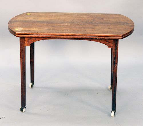 Rosewood cart, serving table with twist top. ht. 25 in., top: 23" x 36 1/2".