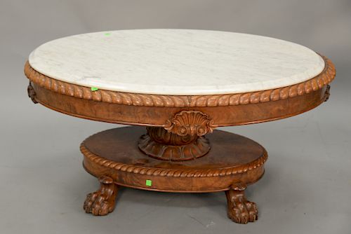 Oval Victorian marble top coffee table. ht. 20 in., top: 30" x 42".