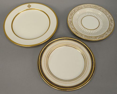 Three sets of porcelain luncheon plates, set of twelve Royal Doulton Lovington Brothers plates, and two sets of twelve cauldon plate...