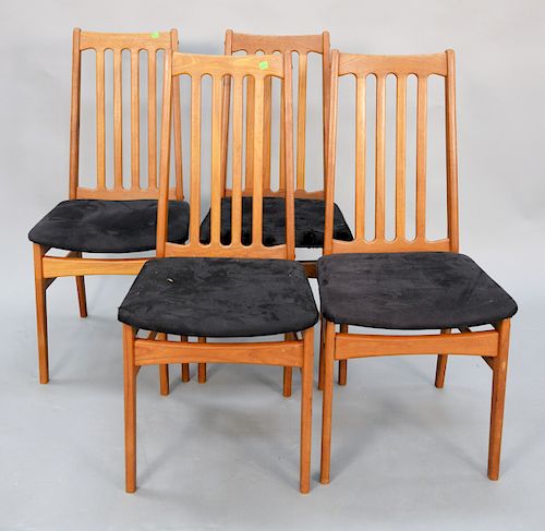 Set of four slat back Scandinavian teak dining chairs. ht. 39 in.