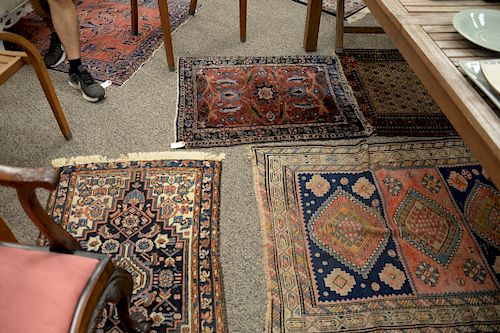 Four antique Oriental throw rugs. 3' x 3'10", 3'6" x 5', 3'3" x 4'4". 