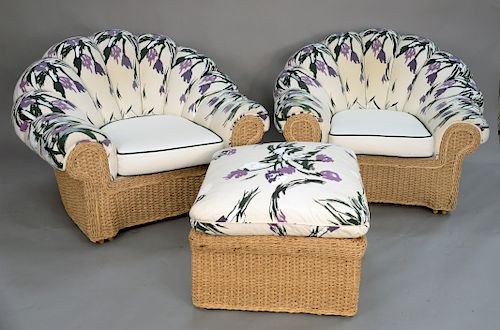 Walters Wicker three piece lot to include pair of woven arm chairs and ottoman. (bottom fraying). ht. 32 in., wd. 44 in.