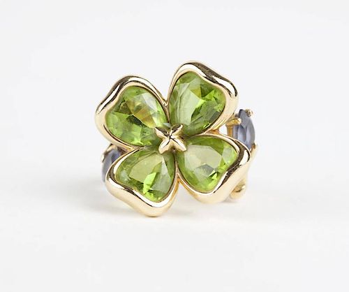 A gold peridot and tanzanite clover ring, Chanel