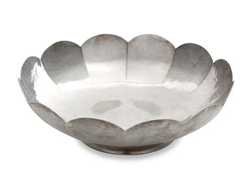 A Silver Bowl<br>together with a silver-plate tea