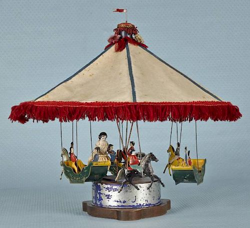 Althof Bergmann tin clockwork carousel with six p