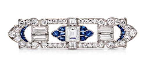An Art Deco Platinum, Diamond and Sapphire Brooch,