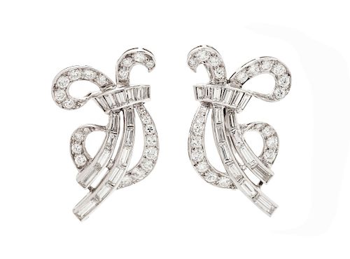 A Pair of Platinum, White Gold and Diamond Earclips,