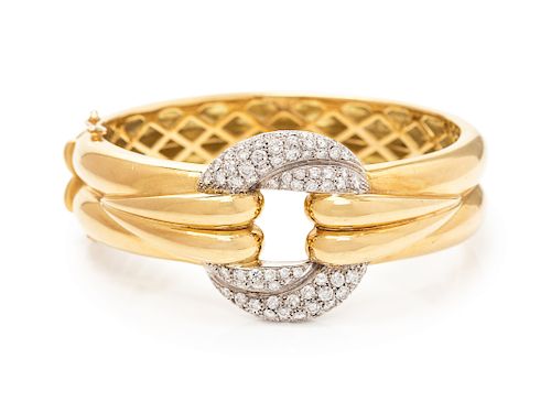 An 18 Karat Bicolor Gold and Diamond Bangle Bracelet,