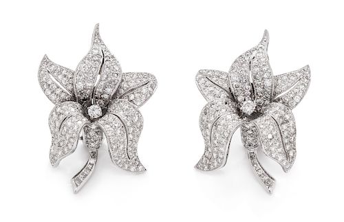 A Pair of 18 Karat White Gold and Diamond Flower Earclips, French,