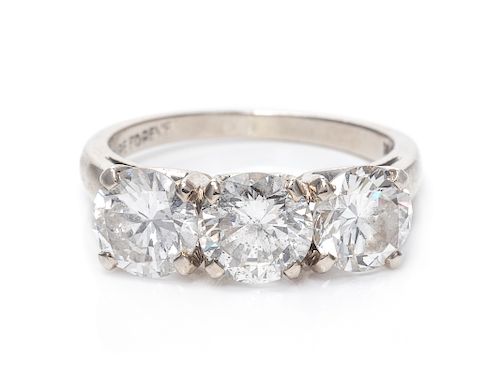 A 14 Karat White Gold and Diamond Ring,