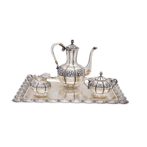 TEA SET. MEXICO, 20TH CENTURY. Sterling 0.925 Silver. Brand: SANBORNS. The body with repoussé and chased strapwork. Comprising a teapot, a sugar bowl,