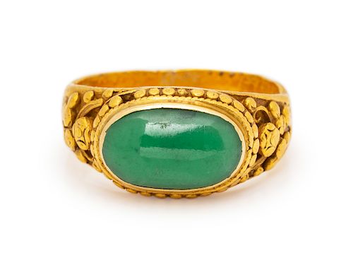 A High Karat Yellow Gold and Jade Ring,