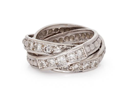 An 18 Karat White Gold and Diamond Rolling Ring,