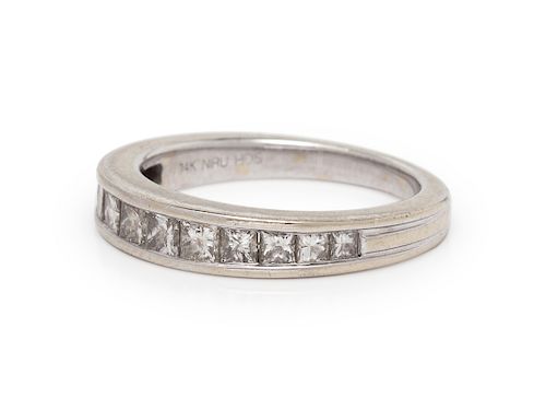 A 14 Karat White Gold and Diamond Ring,