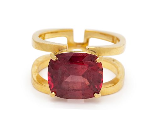 An 18 Karat Yellow Gold and Reddish Orange Sapphire Ring,