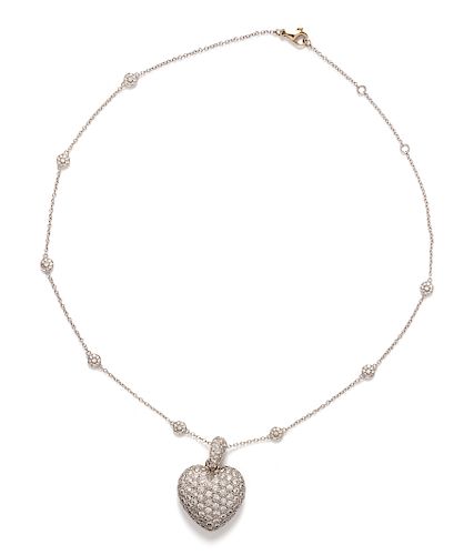 A White Gold and Diamond Heart Pendant/Necklace,