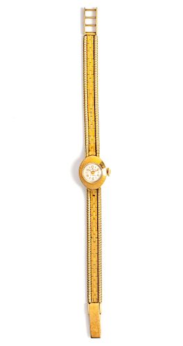 An 18 Karat Yellow Gold Wristwatch, Bucherer,