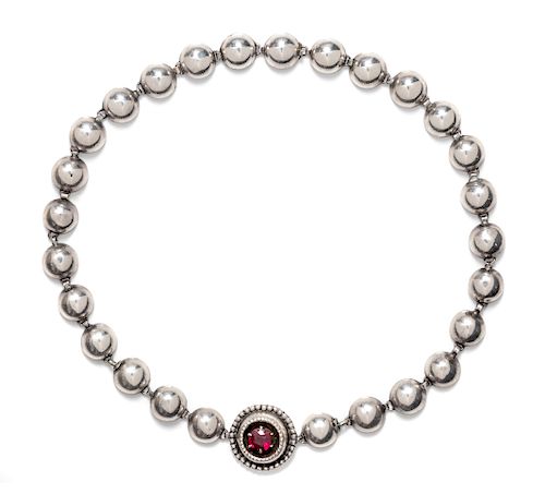 A Silver and Garnet Necklace,